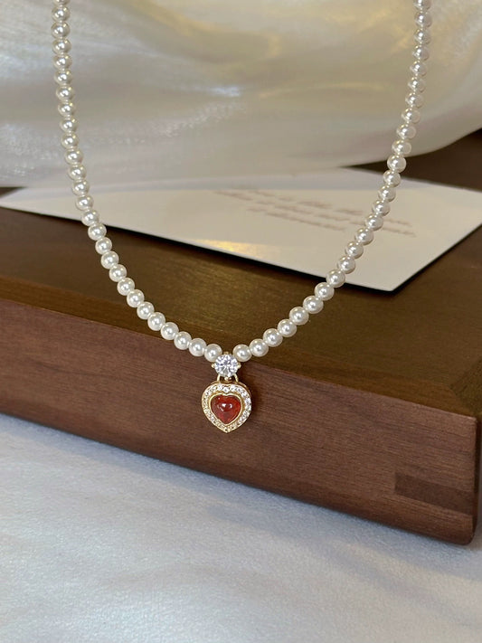 CORAL KISS NECKLACE