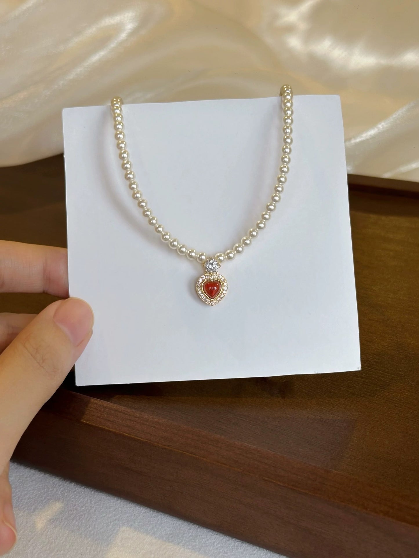 CORAL KISS NECKLACE