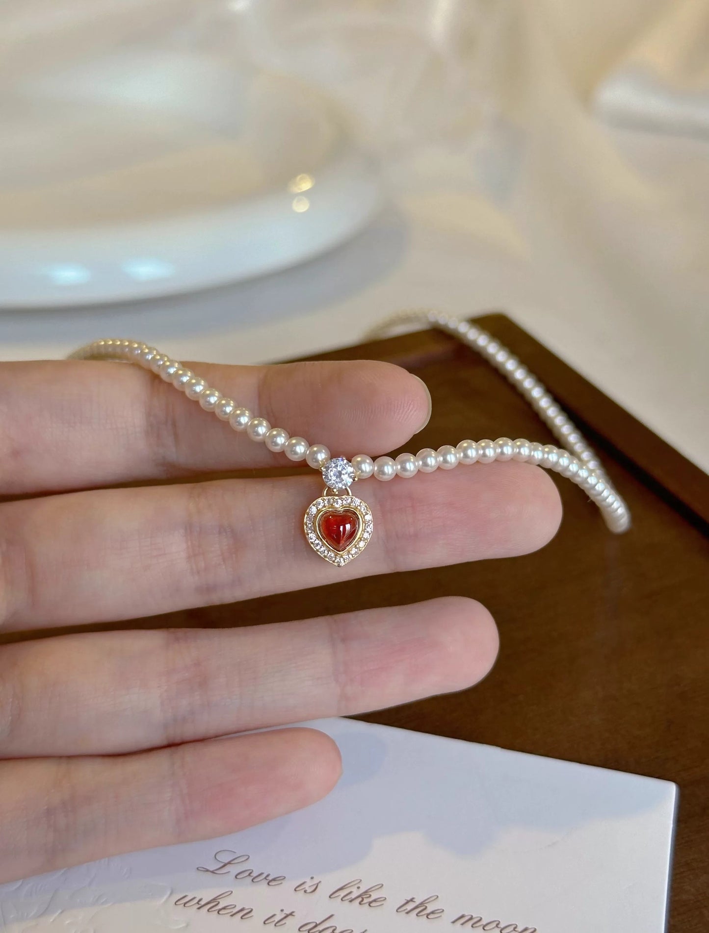 CORAL KISS NECKLACE