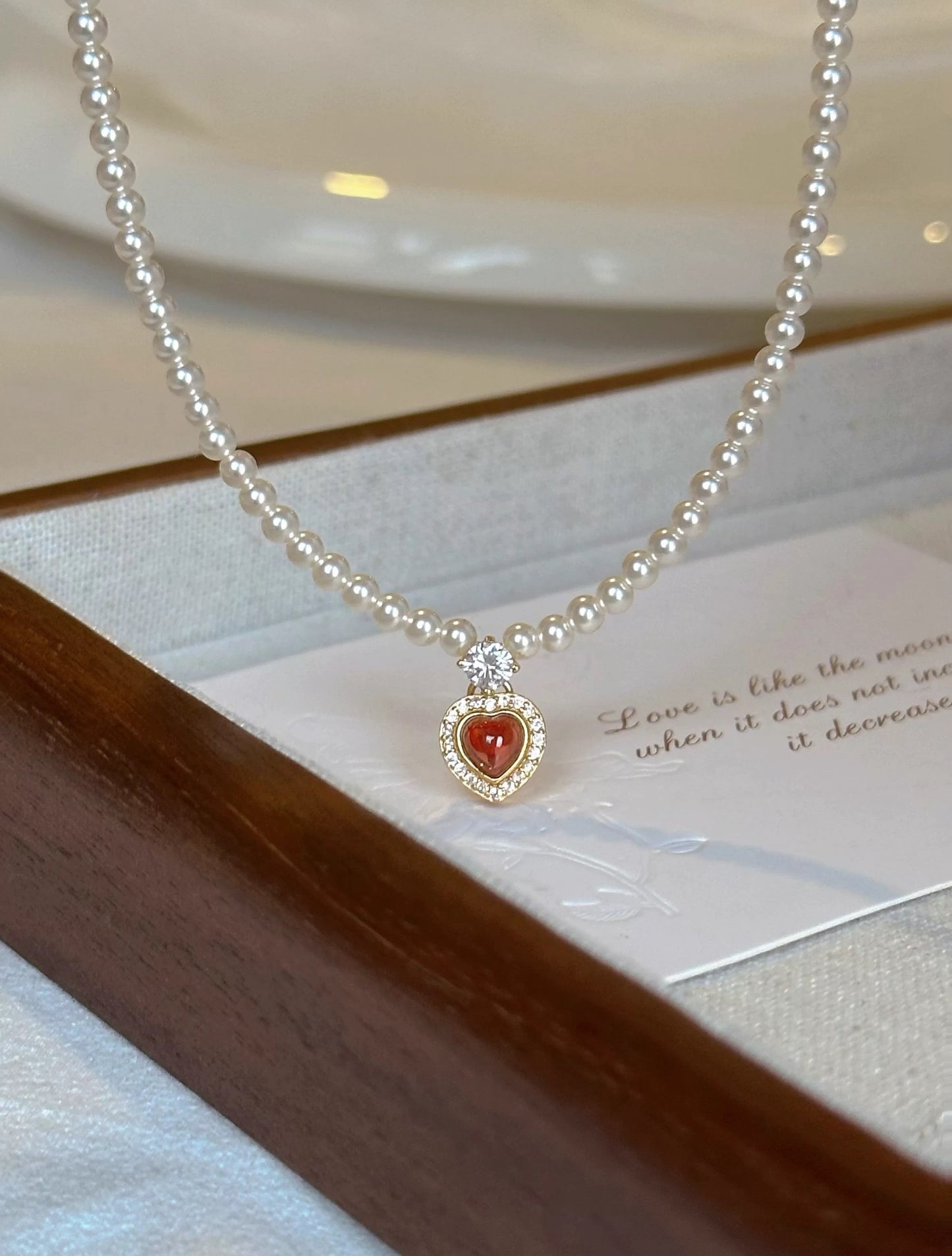 CORAL KISS NECKLACE