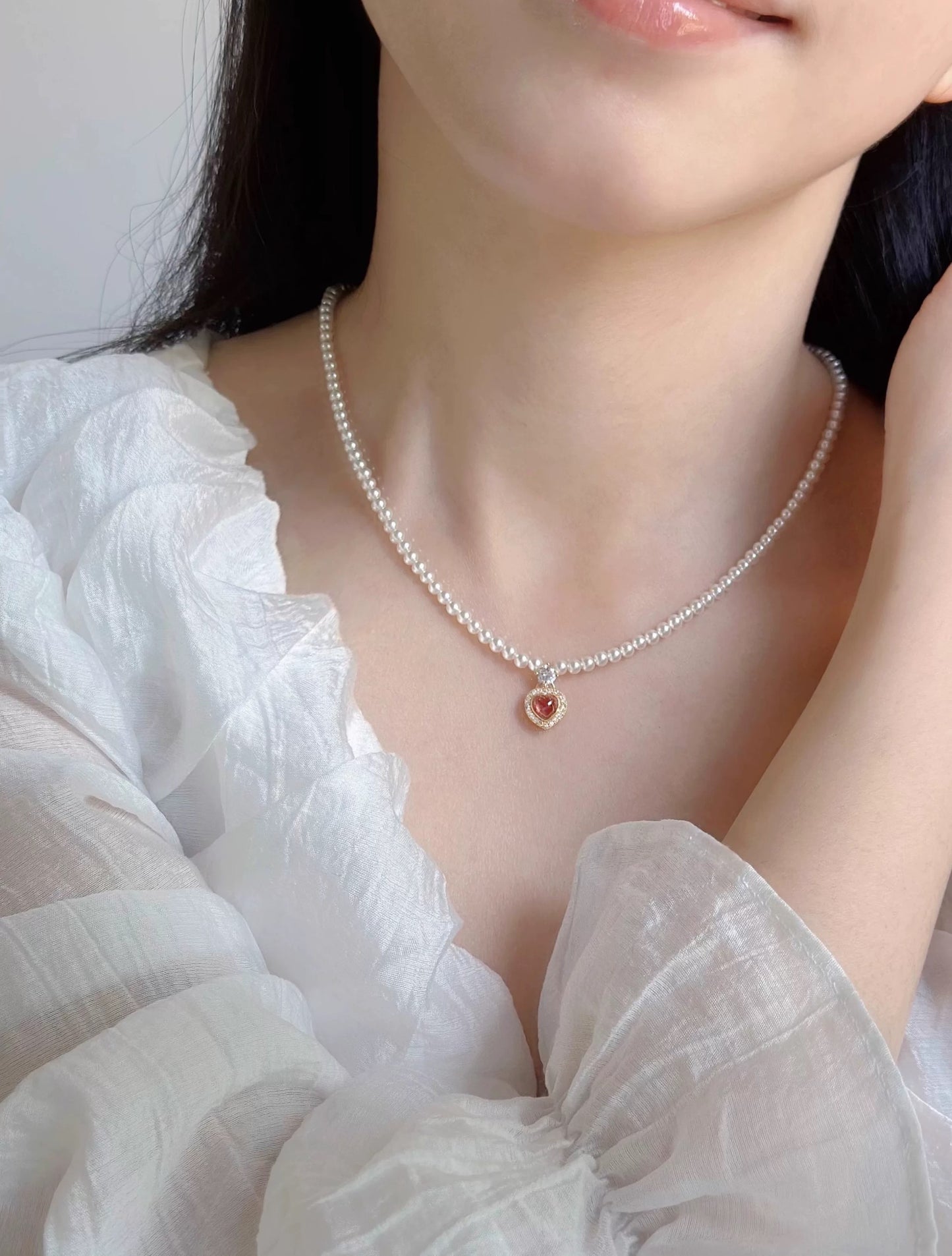 CORAL KISS NECKLACE