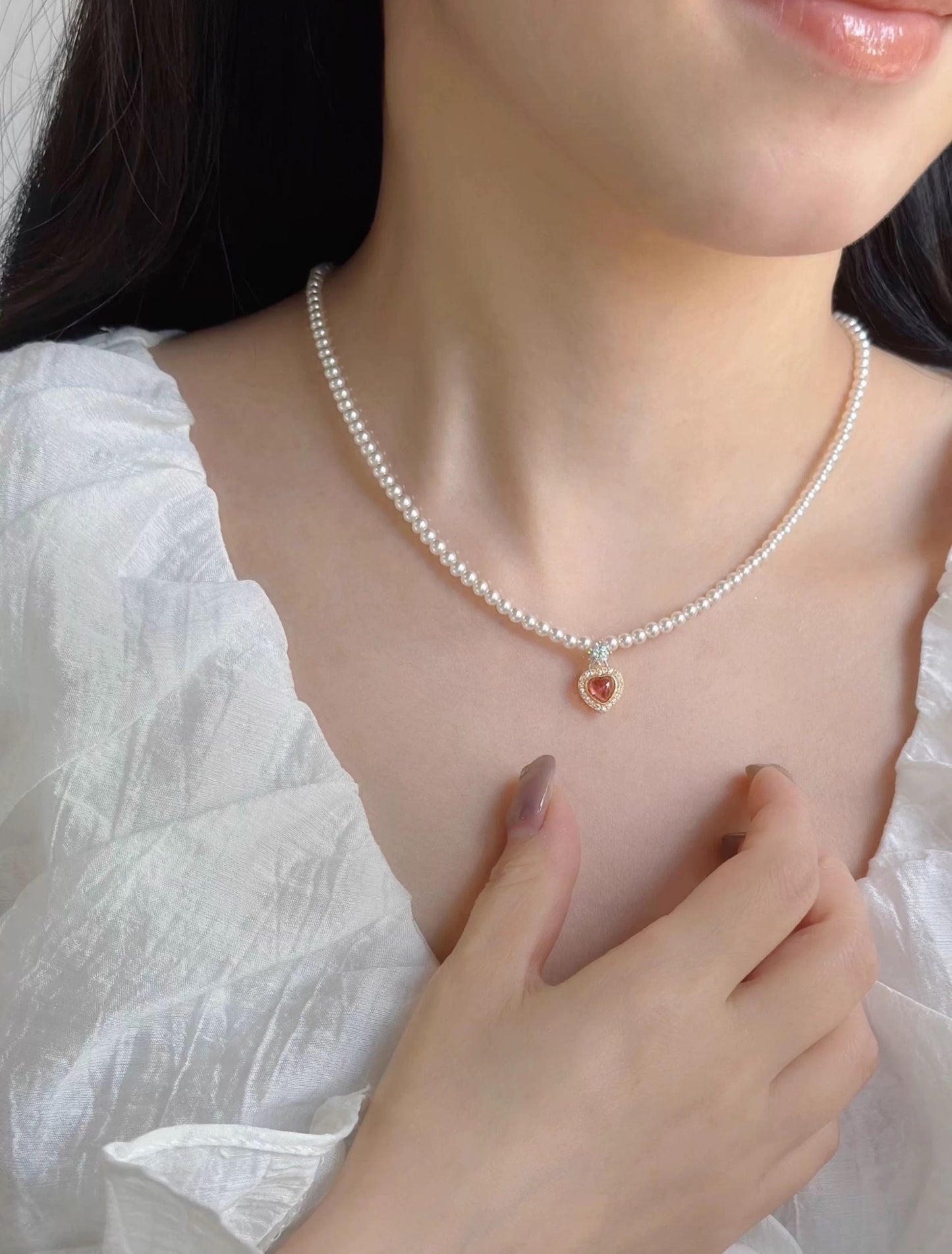 CORAL KISS NECKLACE