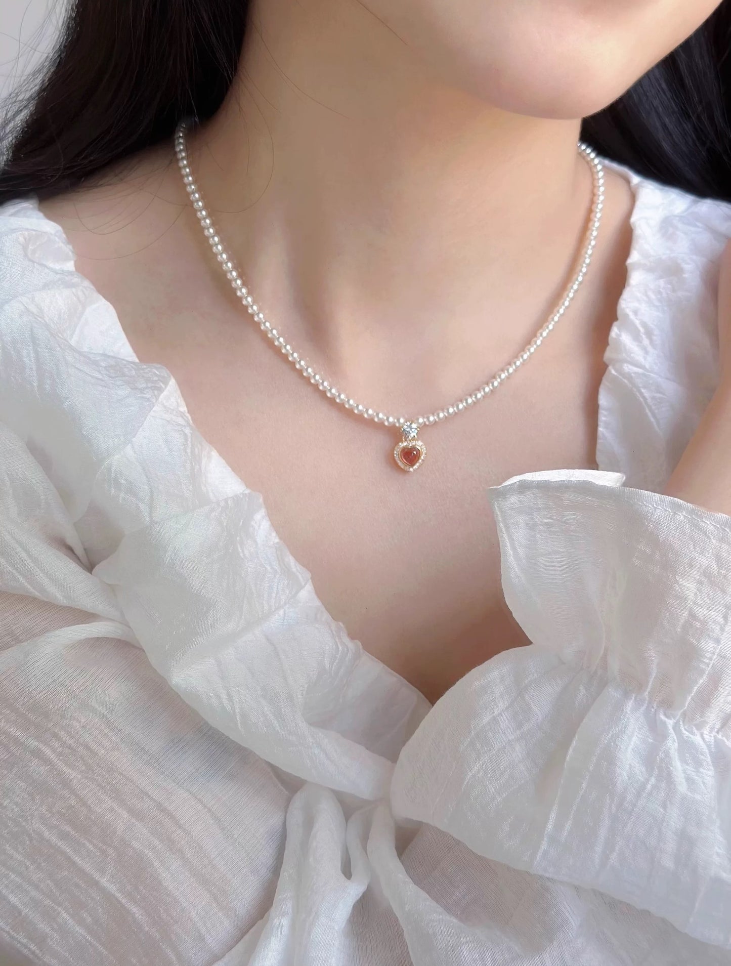 CORAL KISS NECKLACE