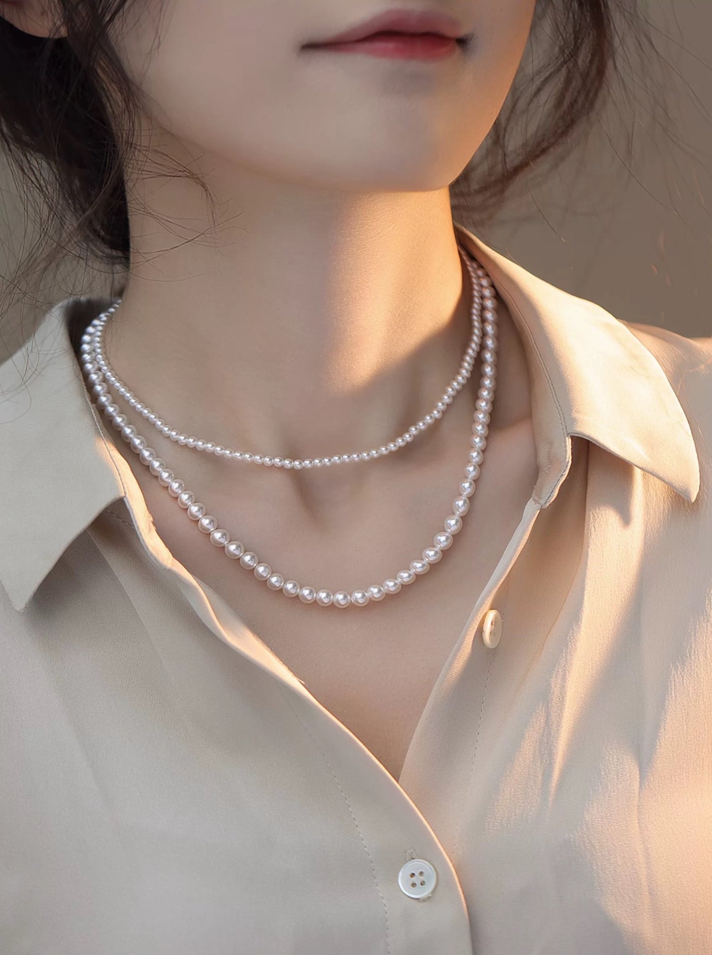 COLLIER DE PERLES LUMINEUSES