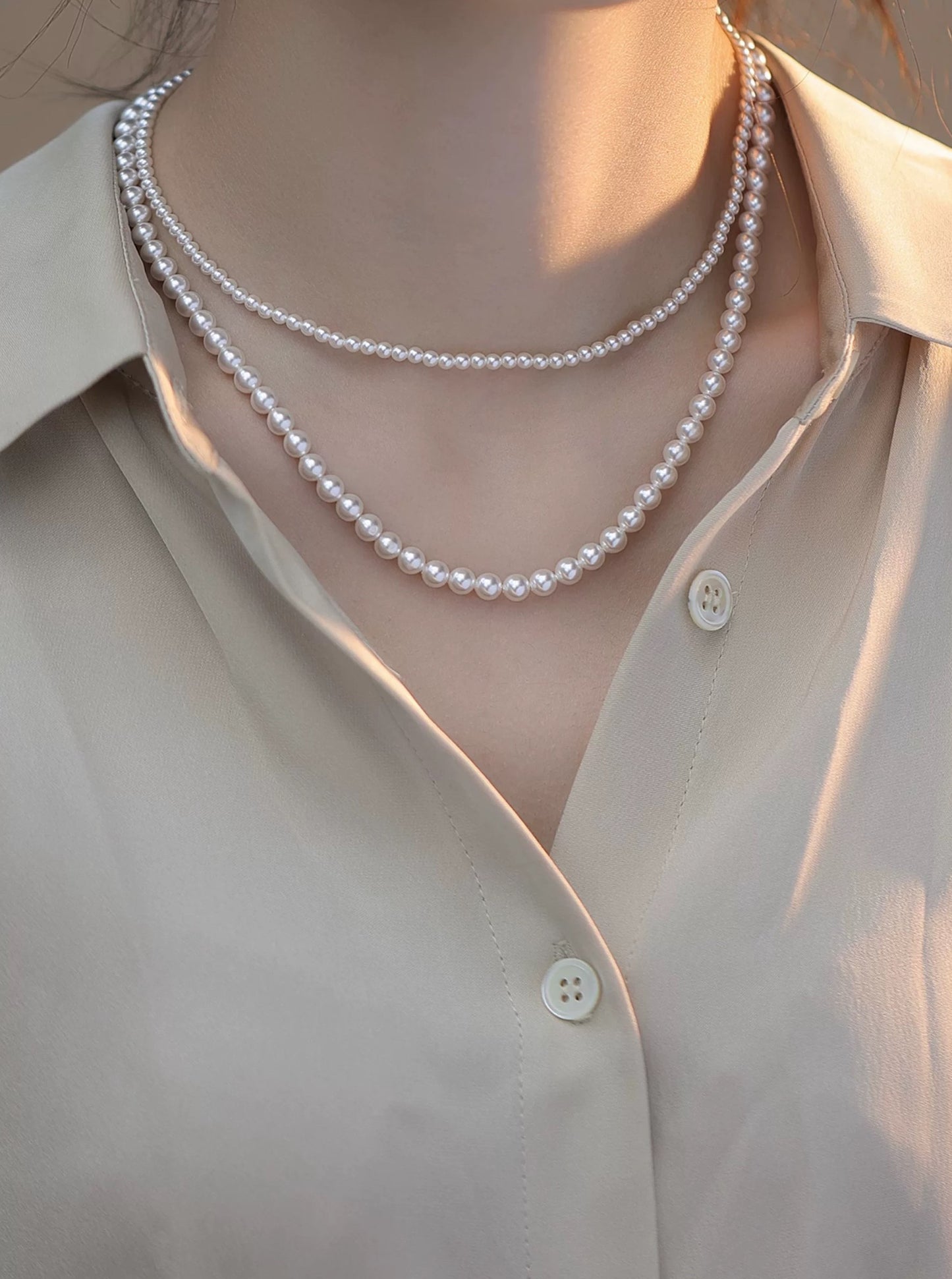 COLLIER DE PERLES LUMINEUSES