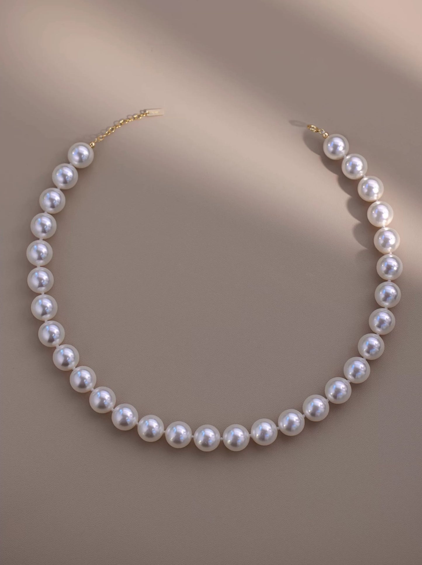COLLIER DE POUPÉE DE PERLES