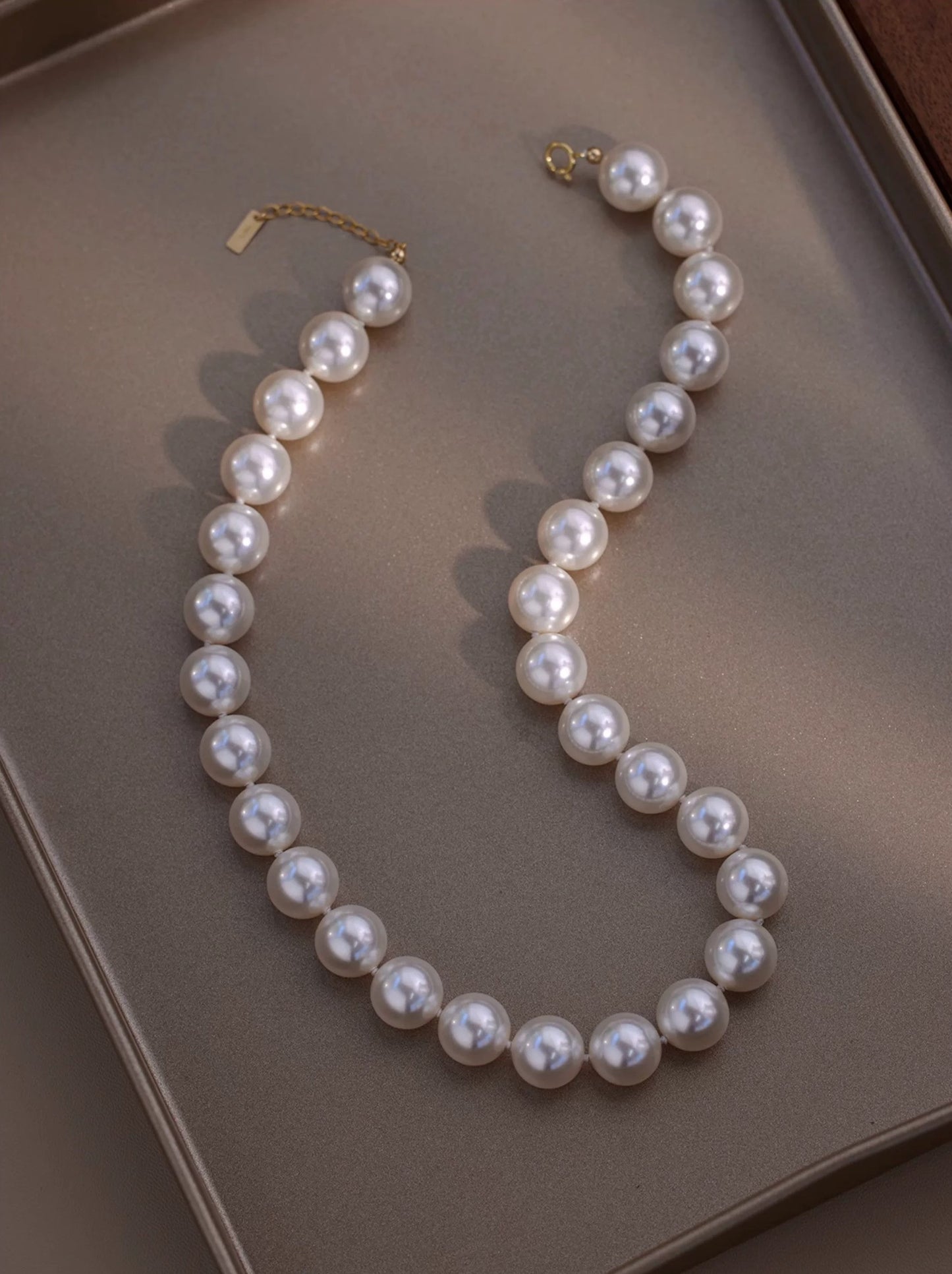 COLLIER DE POUPÉE DE PERLES