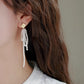 ECHOING PEARL EARRINGS