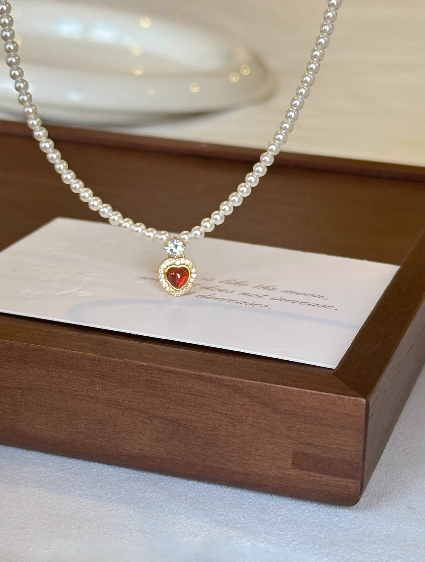 CORAL KISS NECKLACE