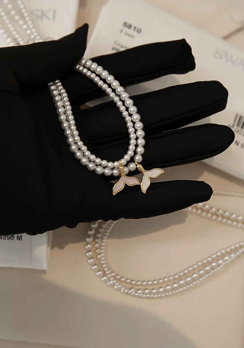 TAILLIGHT PEARL NECKLACE